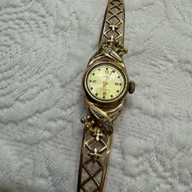 часы золотые чайка