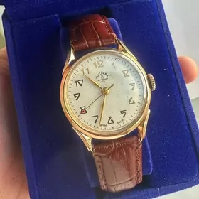 gyzyl sagat золотые часы