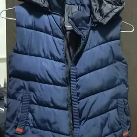 çagalar üçin ýeñsiz kurtka