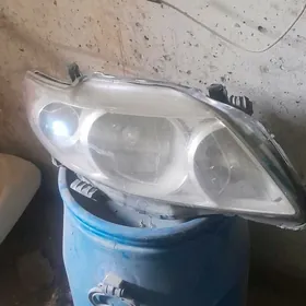 Фар corolla 2009 левая сторона