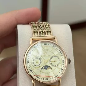 gyzyl sagat золотые часы