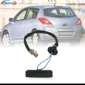 Nissan versa bagaž knopga