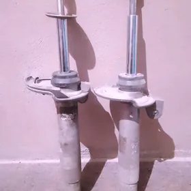 амортизатор е65