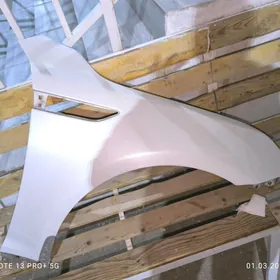 Kia optima sag krylo