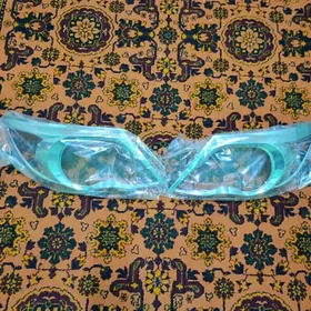 накладки на передние фары