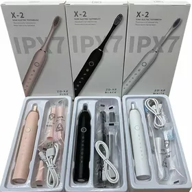 Электрическая зубная щетка