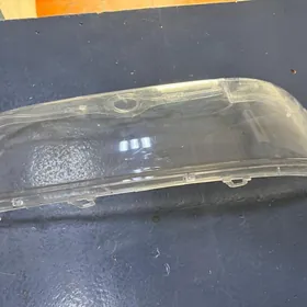 Стекло фарыBMW E39 левое