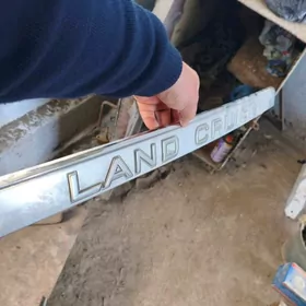 land cruiser emblema