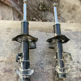 nissan versa amartizator