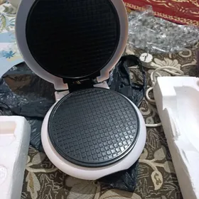 Wafli bişirilÿan