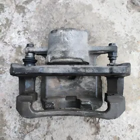 Суппорт тормозной передний