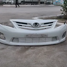 Corolla 2012 bamper oblisowkal