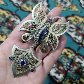 gyzyl çaýylan kümüş brosga