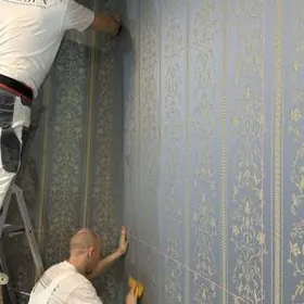 Поклейка обоев Oboyew