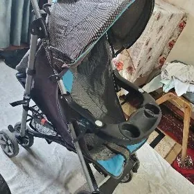 kolyaska we tigir/ коляска