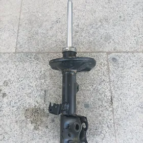 Амортизатор Королла 2009