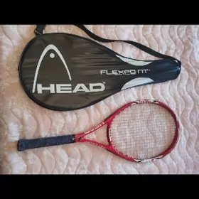 Ракетка для тенниса.