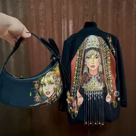 elde cekilen kostyum sumka