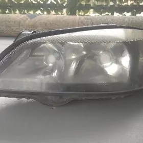 левая фара Опель астра Джи