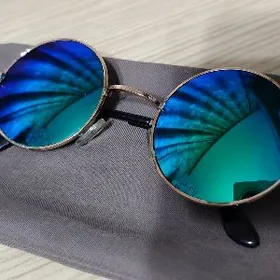 Солнце защитные очки