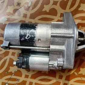 Стартер Ярис, Карола.