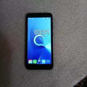 телефон Alkatel