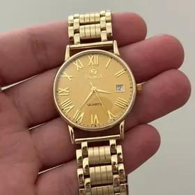 gnomon gyzyl sagat часы