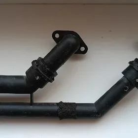 патрубок печки Е32/Е34