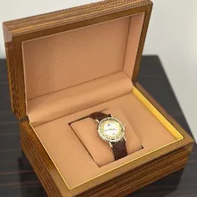 gyzyl sagat золотые часы