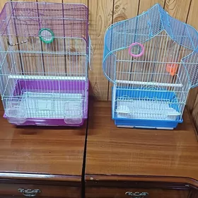 Две клетки для попугаев