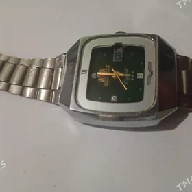 часы sagat позолота