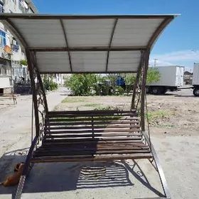 Качеля уличная