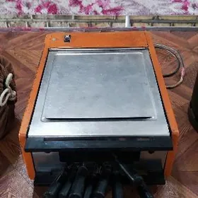 tokl bilen ishleyan mangal