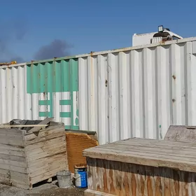 konteýner içiniñ goşy bilen