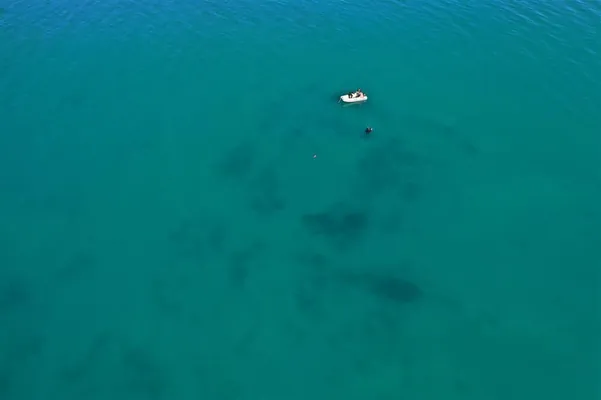 Arheologlar Yssyk-kölüň düýbündäki suw astynda galan orta asyr şäheriniň syrlaryny açdylar