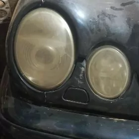Мерседес 210 фары