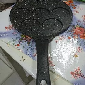 Blinçik bişirýän