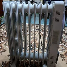 Масляный обогреватель