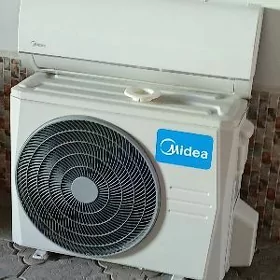 кандисанер Midea
