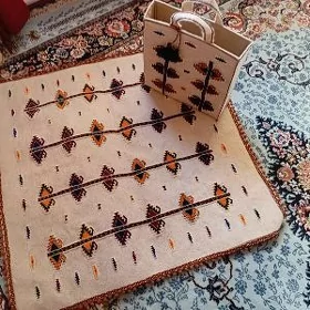 elde dokalan saçakly sumka
