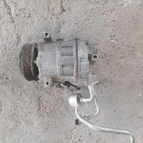 nissan wersa kampresor