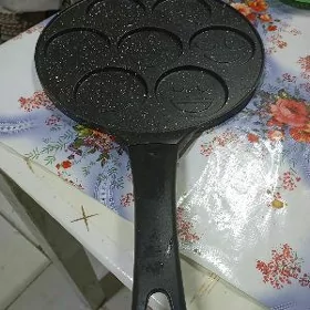 Pankek bişirýän saj