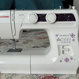 tikin mashyn Janome