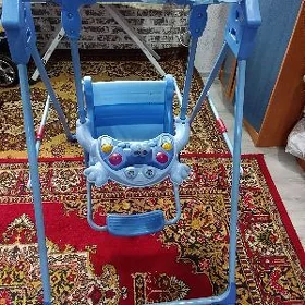 Качеля детская