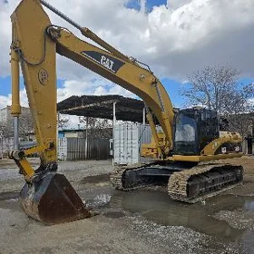 Caterpillar 320 Series 2013