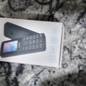 Простой телефон alcatel 1069