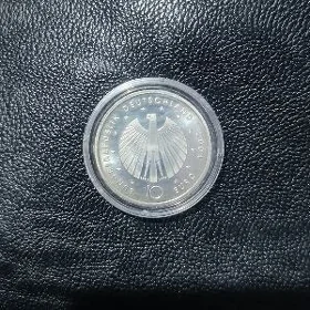 монета moneta kumus