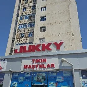 Tikin masyn 12 etaź