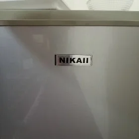 холодильник никай