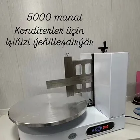 Tortyň kremini çalýan apparat
